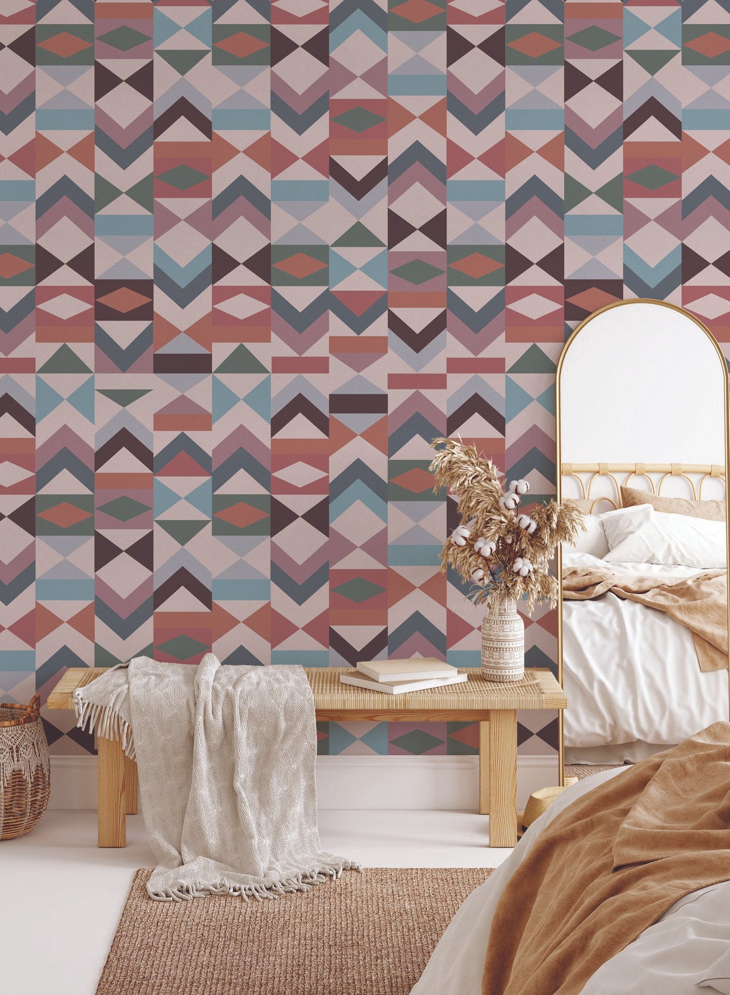 Tangram is a minimalist wallpaper by Opposite Wall of various vertical arrangements of colourful triangles.