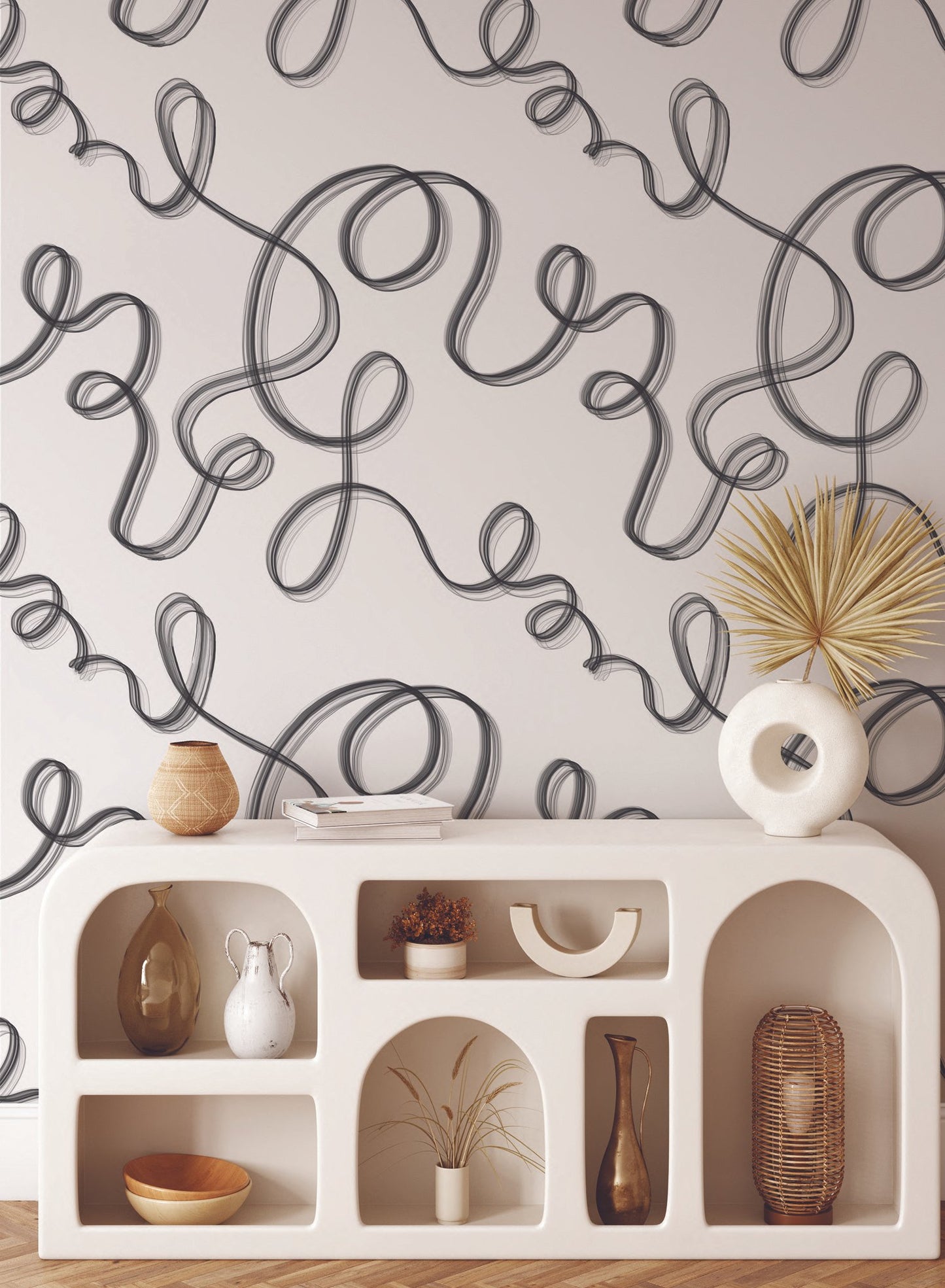 Up in Smoke is a minimalist wallpaper by Opposite Wall of cursive lines travelling on the wall.