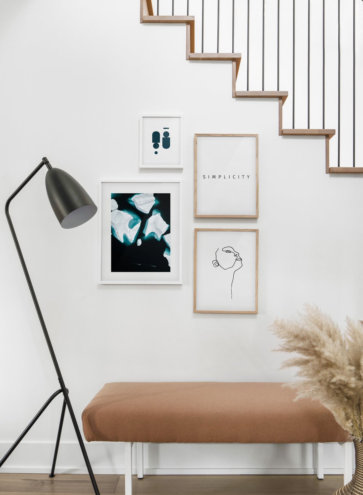 Scandinavian poster by Opposite Wall with black and white graphic typography design of Simplicity - Hallway with gallery wall quadruple