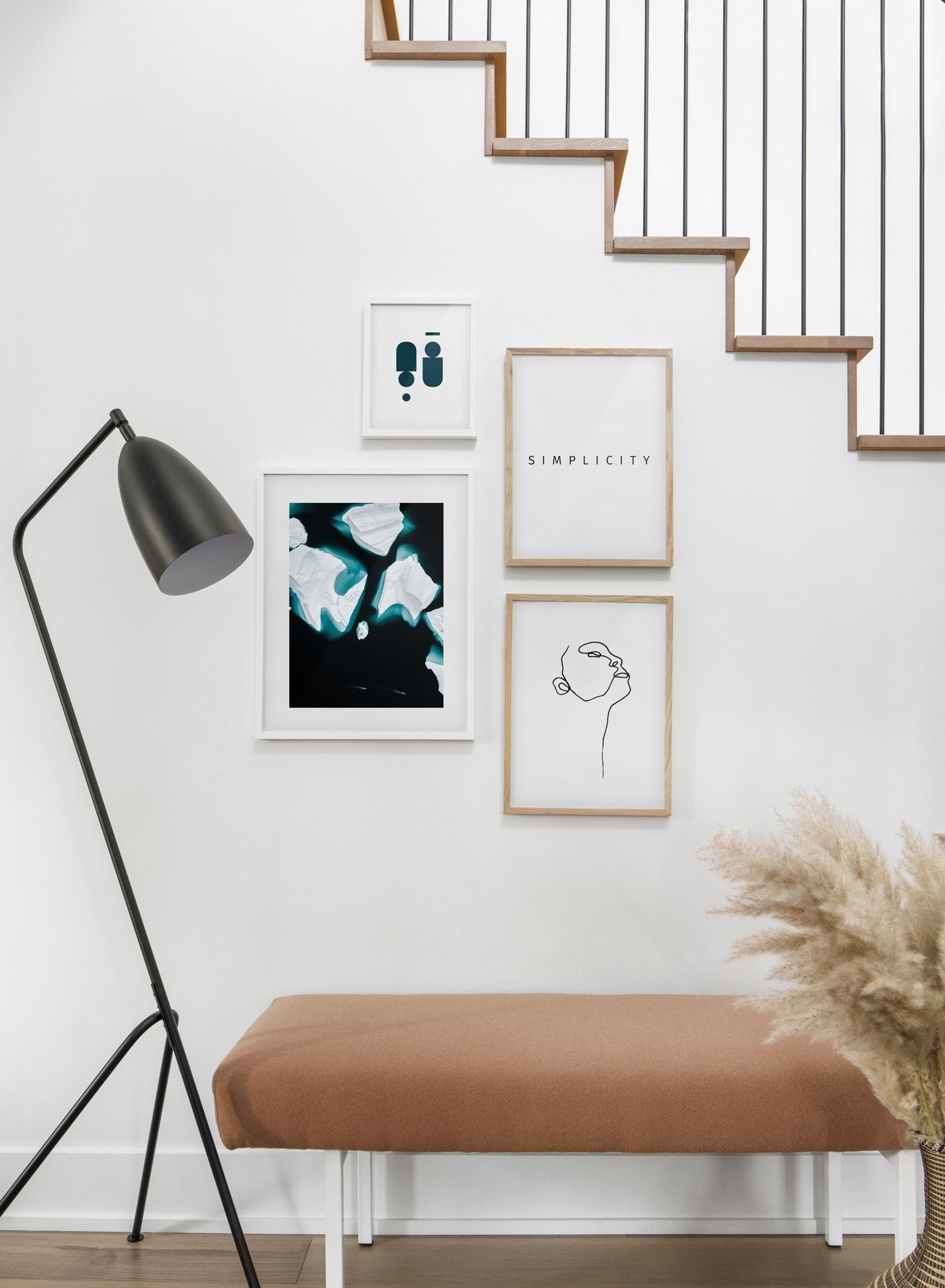 Scandinavian poster by Opposite Wall with black and white graphic typography design of Simplicity - Hallway with gallery wall quadruple