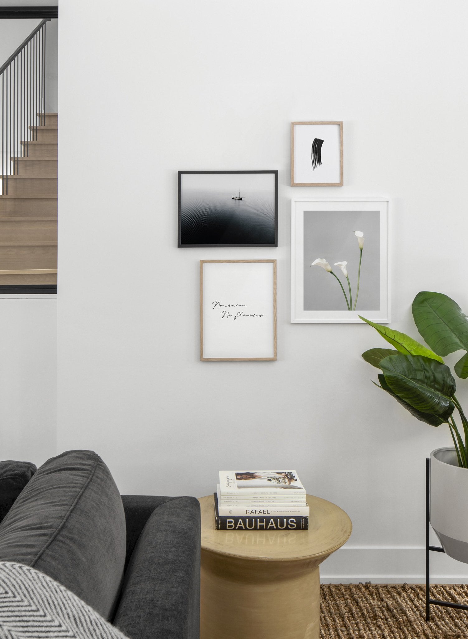 Minimalist poster quad featuring floral photography of white calla lily flower - Living Room