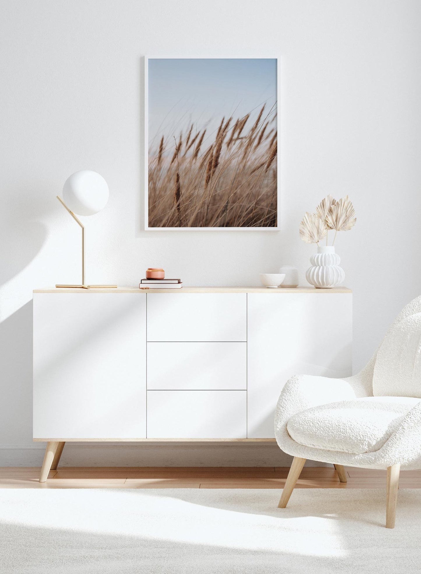 "Prairie Feathers" is a botanical photography poster by Opposite Wall of rich blond cereal grasses swaying in the golden hour under a clear blue sky.