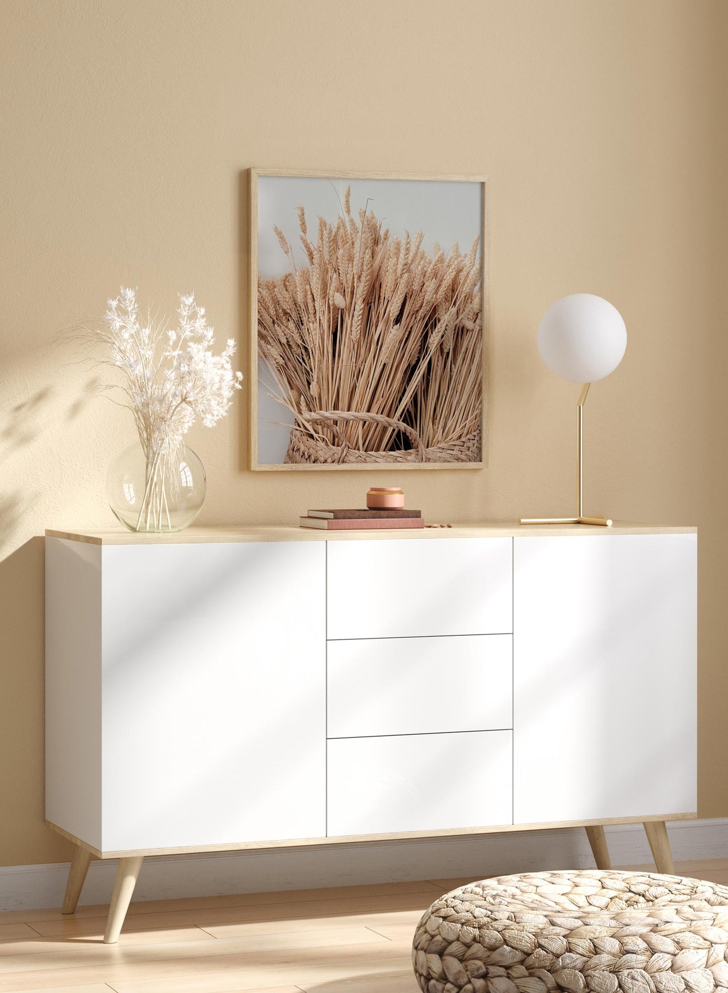 "Wheat Abundance" is a botanical photography poster by Opposite Wall of a weaved basket filled with beautiful rich blond and beige wheat grasses.