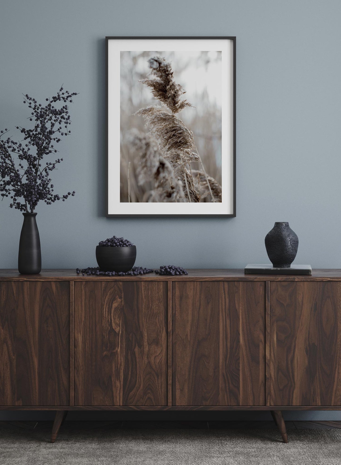 "Wintry Plumes" is a botanical photography poster by Opposite Wall of fluffy pampas grasses in a cold climate setting.