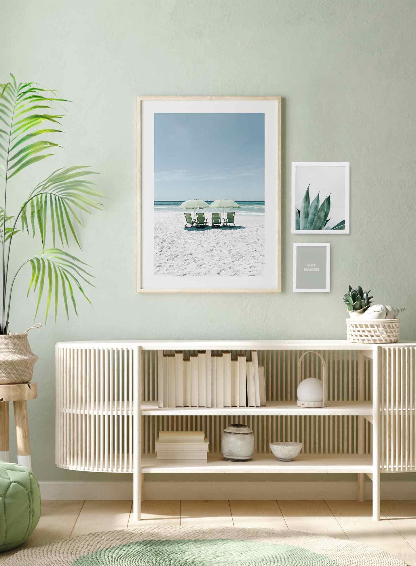 Just Chilling is a beach photography poster of beach chairs under parasols on a white sandy beach by Opposite Wall.