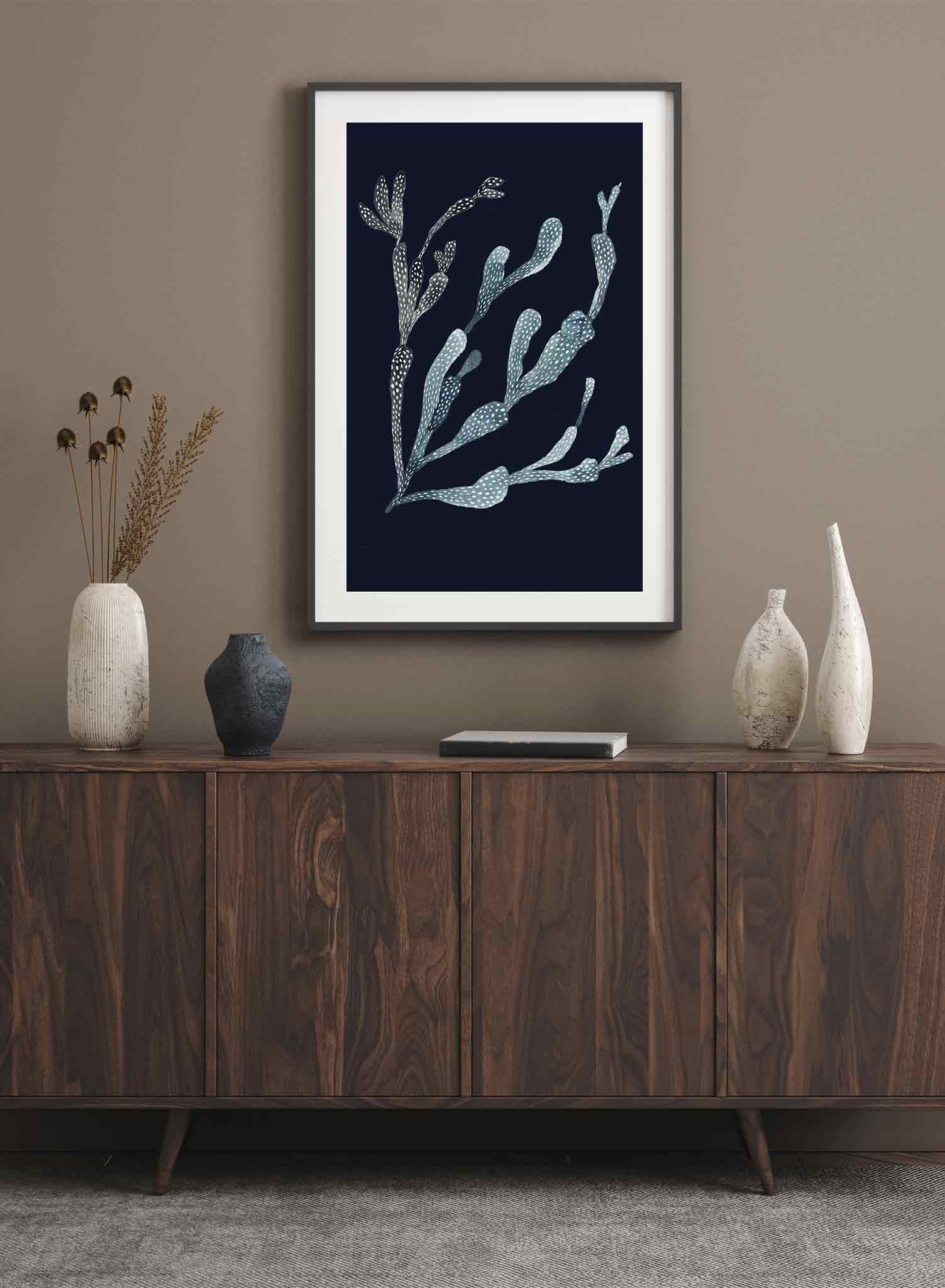 Navy Coral is a minimalist illustration of a slightly slanted underwater neon branch of coral by Opposite Wall.