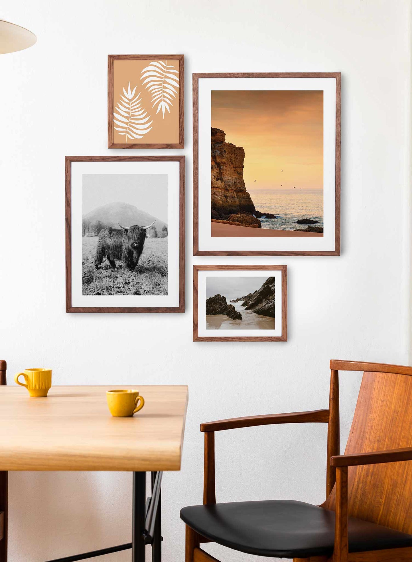 Creamsicle Sky is a minimalist photography of the sun setting on a beach where stands a rock formation with birds flying around by Opposite Wall.