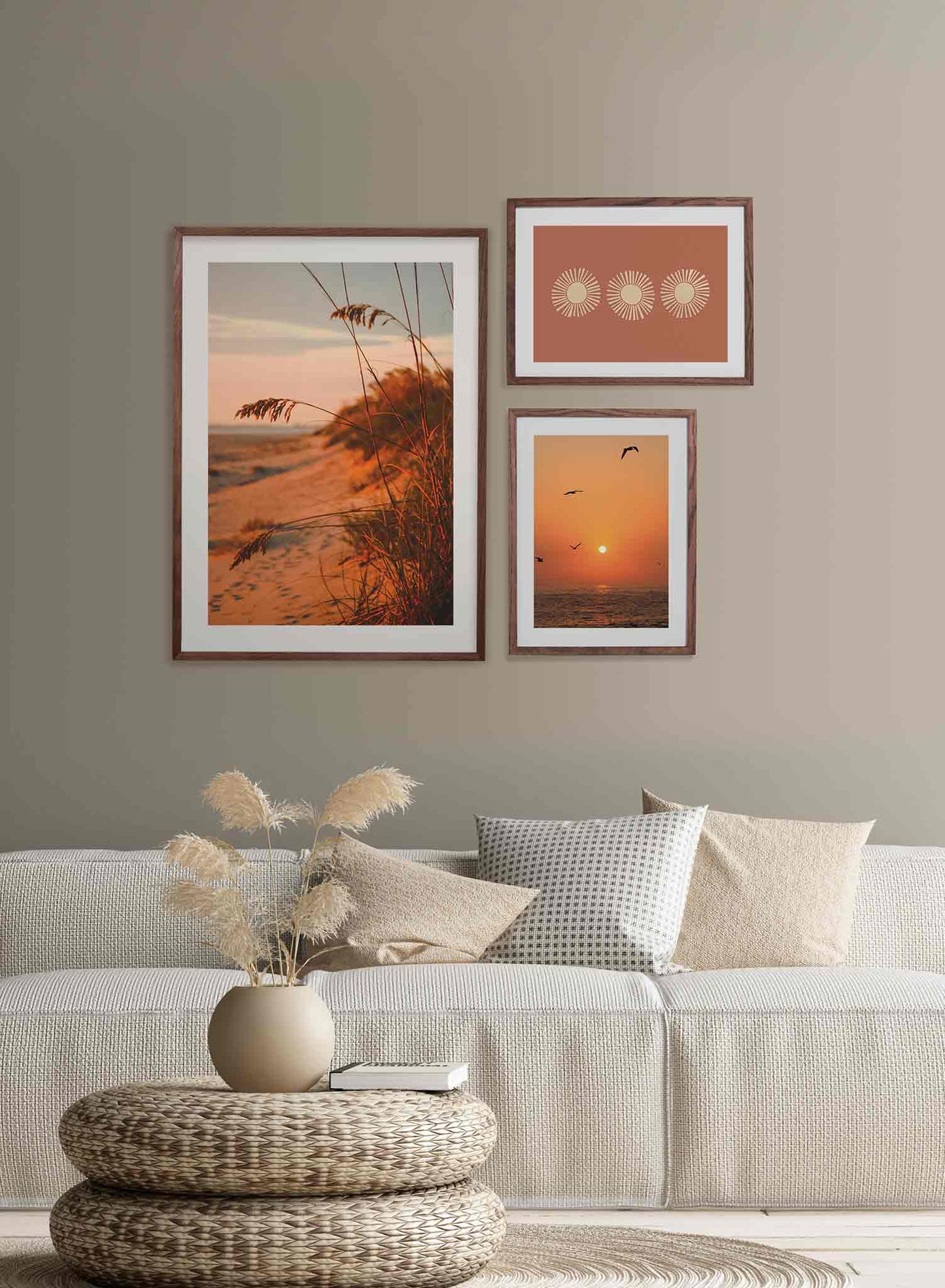 Dune Feathers is a minimalist photography of beach grass overlooking a beach filled with footsteps and where the sun is setting by Opposite Wall.