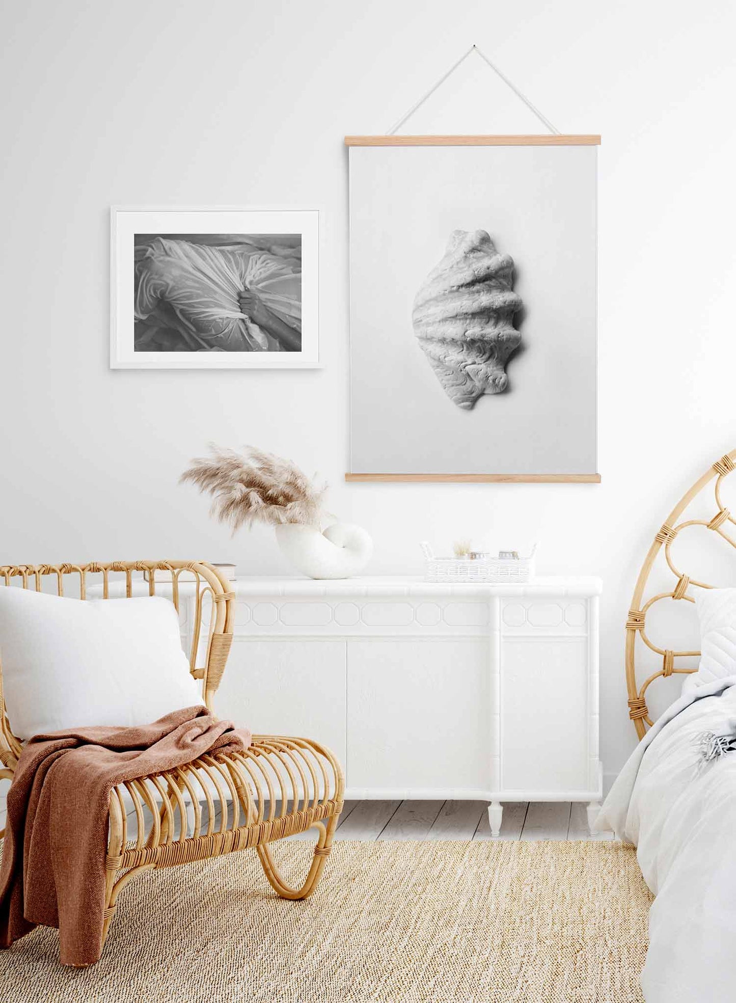 Scallop Shell is a minimalist photography of a close-up shot of a white scallop shell facing the right side by Opposite Wall.