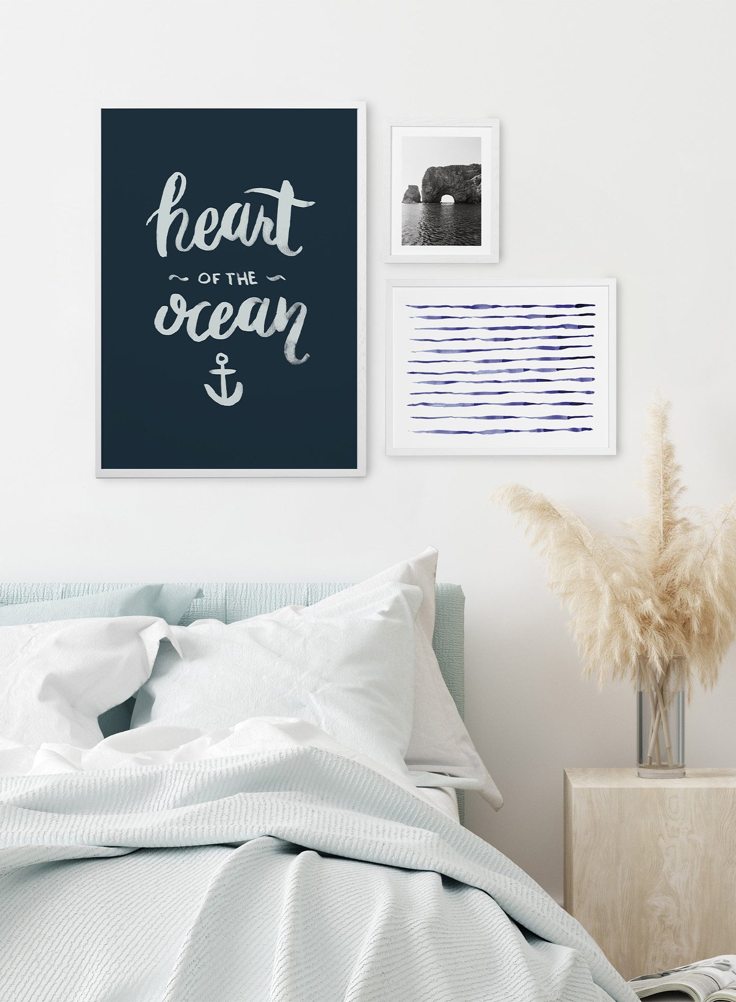 Heart of the Ocean is a minimalist illustration and typography of the words "heart of the ocean" written cursively with an anchor at the bottom.