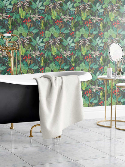 Tropicalia is a minimalist wallpaper by Opposite Wall of a variety of tropical plant leaves.