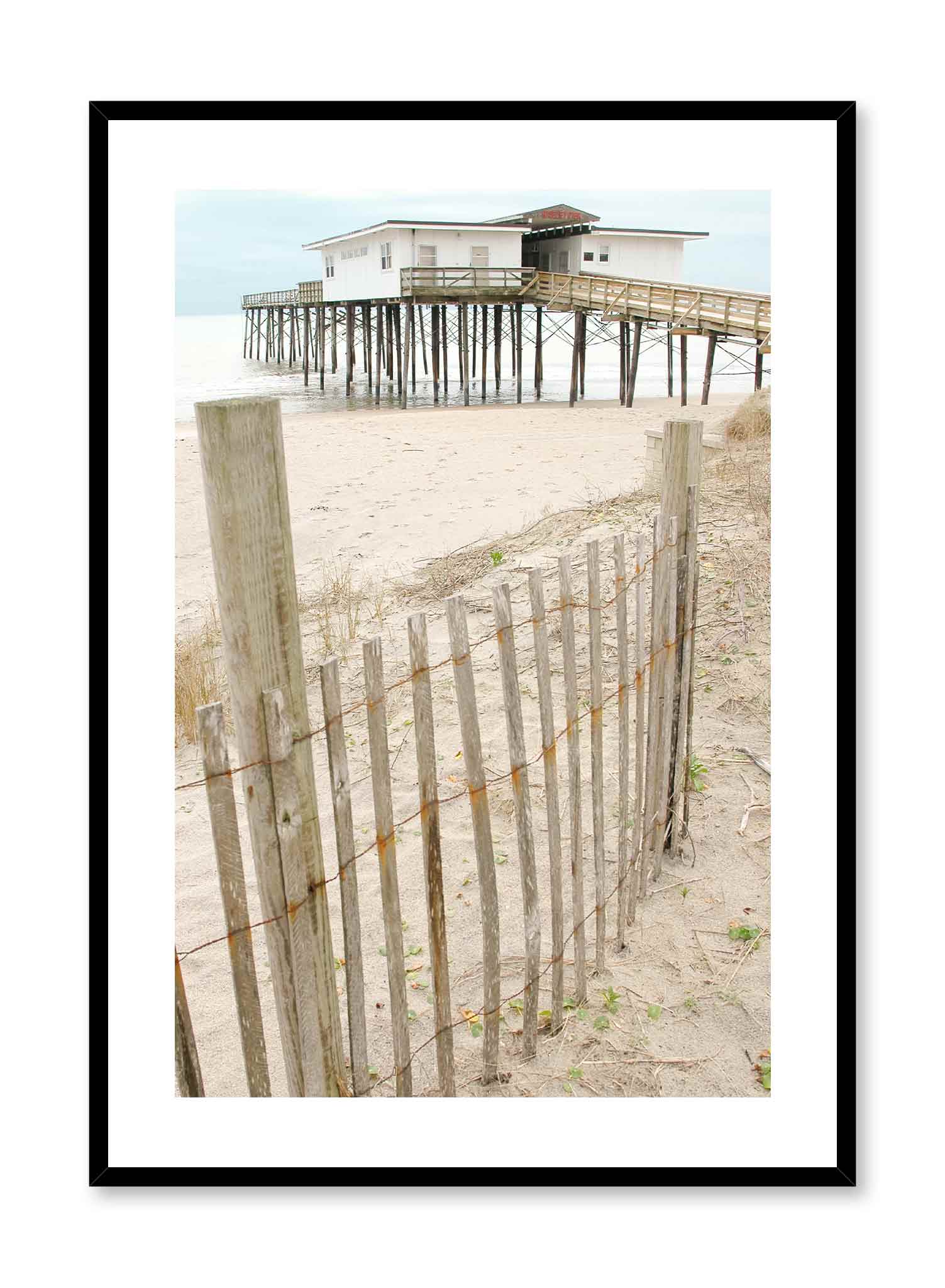 Beach House is a minimalist photography of the perspective of the observer walking down a walkway leading to the beach overseeing a beach house by Opposite Wall.