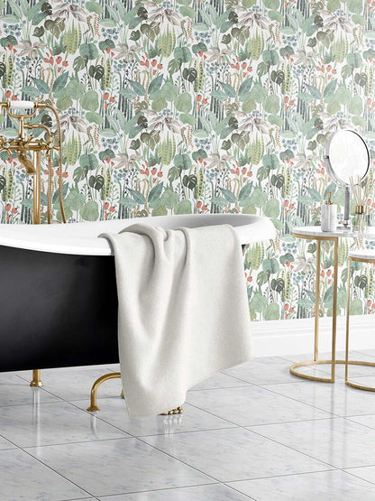 Tropicalia is a minimalist wallpaper by Opposite Wall of a variety of tropical plant leaves.