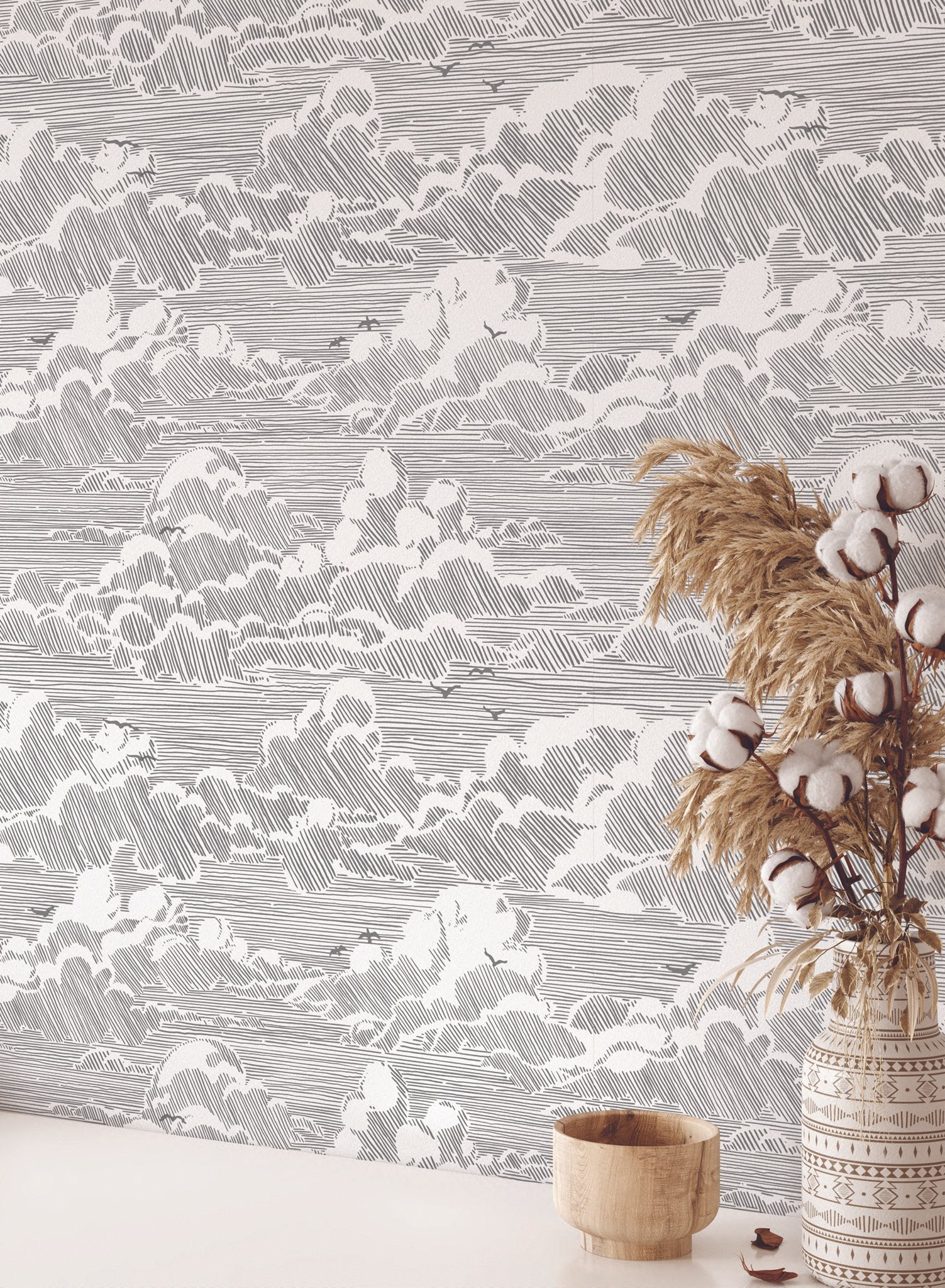 Sky Bound is a minimalist wallpaper by Opposite Wall of a cloudy sky background with birds flying across.