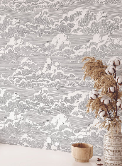 Sky Bound is a minimalist wallpaper by Opposite Wall of a cloudy sky background with birds flying across.