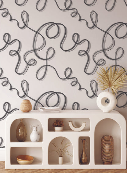 Up in Smoke is a minimalist wallpaper by Opposite Wall of cursive lines travelling on the wall.